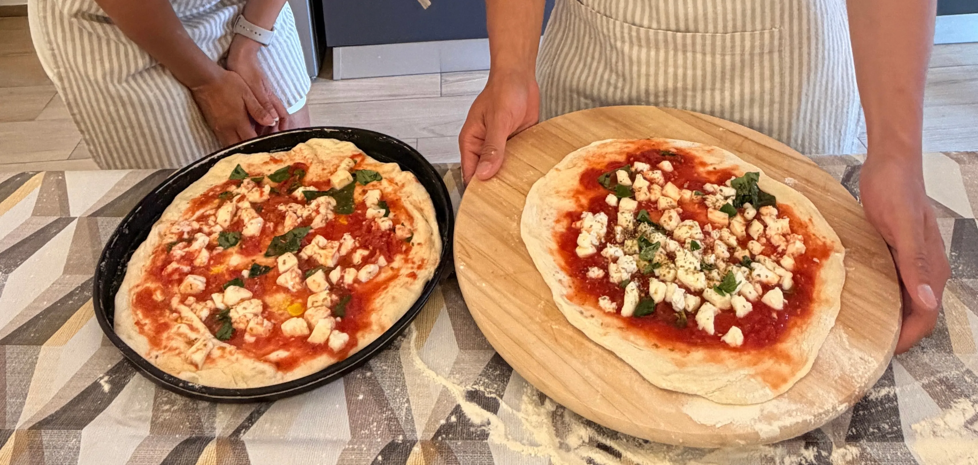 Homemade margherita pizzas at a pizza making class near Cagliari.